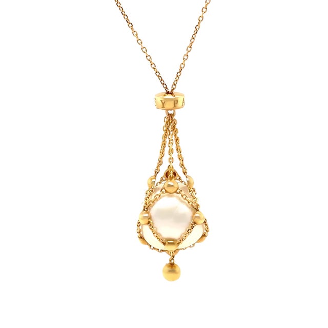 An authentic Paspaley 18ct yellow gold Lavalier necklace, featuring a loose 13 mm Australian South Sea circle pearl...