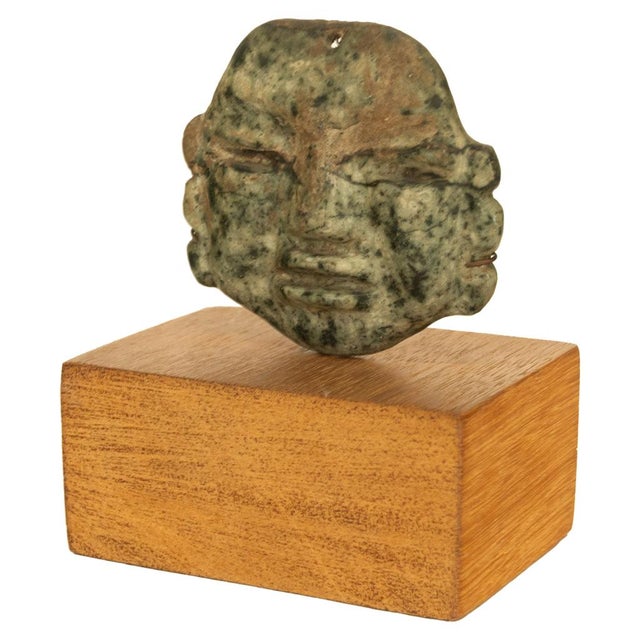 An important ancient Pre-Columbian Olmec civilization Hand-Carved Jade face Mask Pendant, 900-600 BC, ex-museum...
