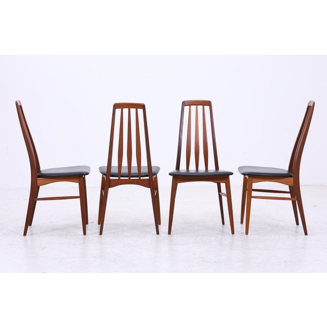 Original set of four "Eva" dining chairs by Niels Koefoed from Denmark. The slim silhouette, the elegantly curved...