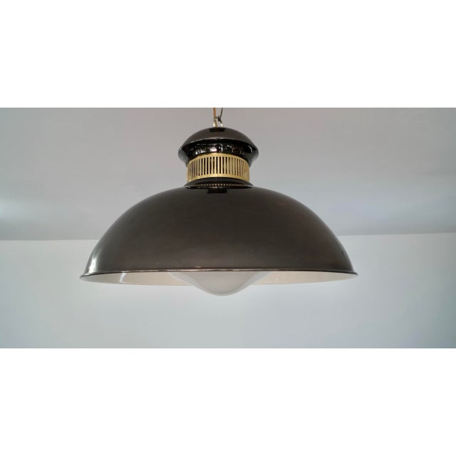 Vintage Hollywood Regency ceiling light fixture for sale. It's in great vintage condition, and has a special black chrome...