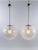 Elegant and highly decorative mid-century modern globe pendant lamps or hanging lights. The shades of the pendant lamps...