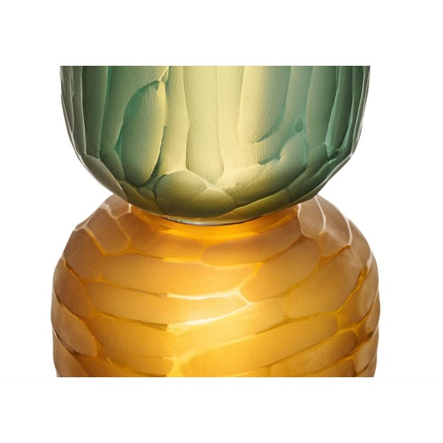 Floor lamp from the island of Murano outside of Venice, Italy. This piece is made with a chrome structure and hand-blown...
