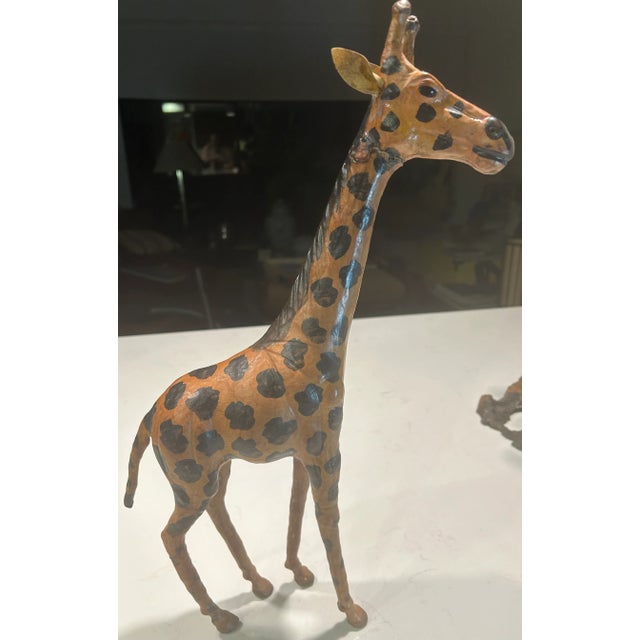 Inspired by the world of Ralph Lauren. Go on safari without ever leaving your home! This Mid Twentieth Century giraffe...