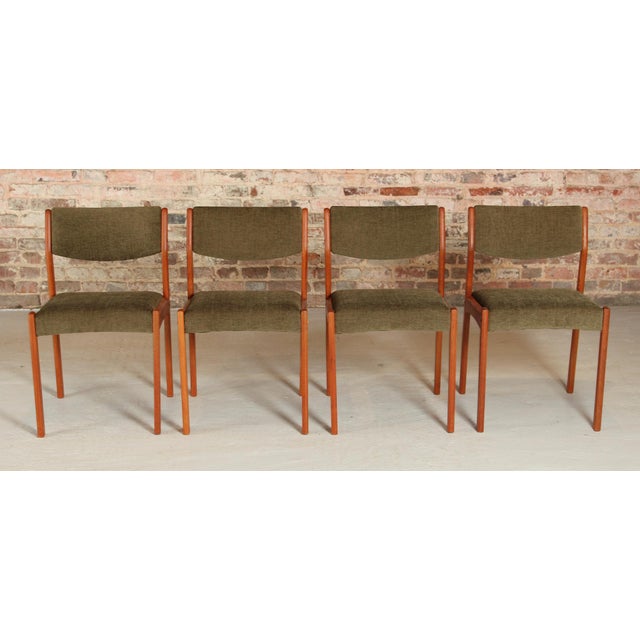 Set of 4 Danish teak dining chairs, circa 1960s. Newly reupholstered with green fabric. Excellent condition. W 45cm D 48cm...