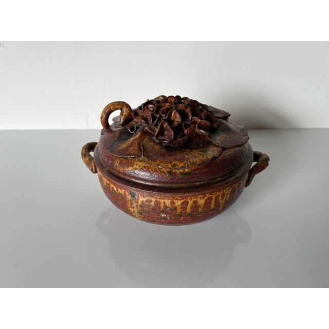 Beautiful glazed Mid-century ceramic casserole with wonderful color and beautiful form. This pottery is signed "illegible...