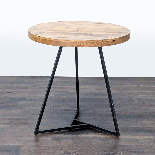 Reclaimed pine tabletop on a metal base. Brand: West Elm. Original Price: $400. Dimensions (in): 30W x 30D x 31H.