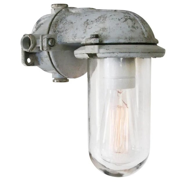 Industria rotterdam industrial wall light cast aluminium, clear glass e27 / e26. Depending on destination, all lights are...
