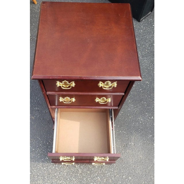 Avery cute two drawer Chippendale Style filing cabinet in good vintage condition in mahogany finish. Measures 16.5" in...
