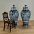 Impressive pair of Chinese porcelain blue and white lidded palace urns handcrafted in classic form with elaborate hand...