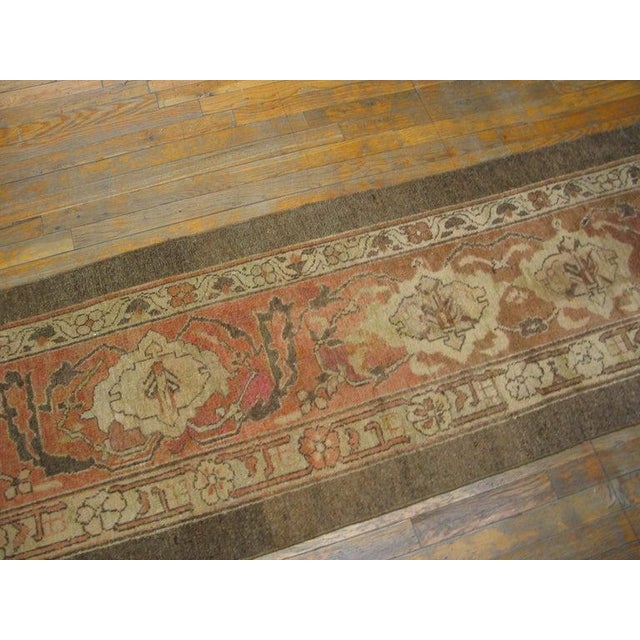 Antique Indian Agra rug, size: 2'5" x 28'3". Antique Agra Hallway Runner Wool Coral Rug, Circa Date: 1940s. This...