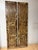 Bring centuries-old craftsmanship into your home with these antique carved wood double doors, beautifully adorned with...
