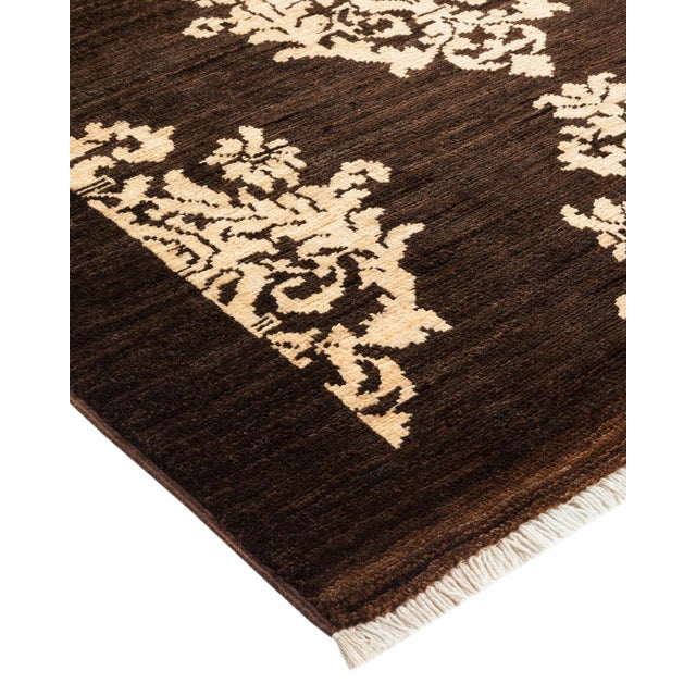 With an amalgam of sizes and aesthetic influences ranging from art deco to Rorschach and modernist, the rugs in the...