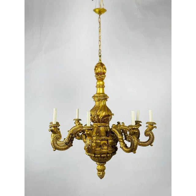 The George I style carved giltwood chandelier by Vaughan Design is the epitome of luxury and elegance. This stunning...