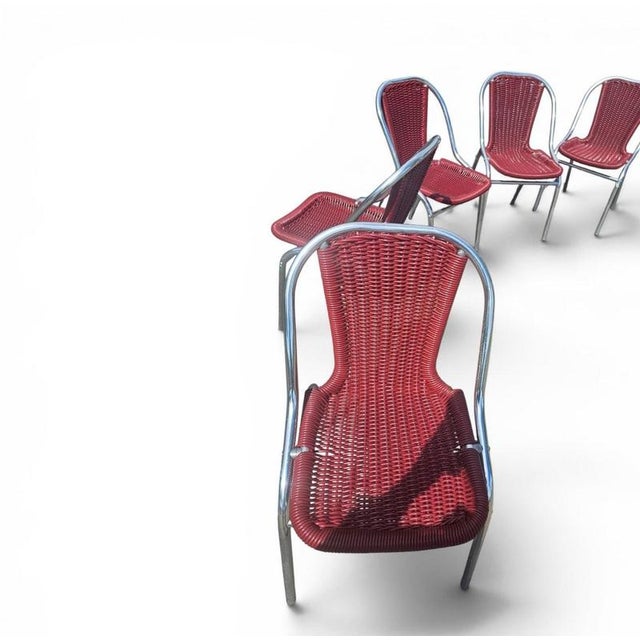 6 x red aluminum inside / outsite chair featuring synthetic weave (wicker/rattan look) 1980s Height 80Width 45Depth 50Seat...