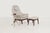 Danish Modern Lounge Chair and Ottoman, c. 1960 Elegant mid-century lounge chair and ottoman featuring solid oiled walnut...