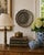 A handsome mid-20th-century German pewter wall plate centered by a richly modeled heraldic coat of arms. The shield bears...