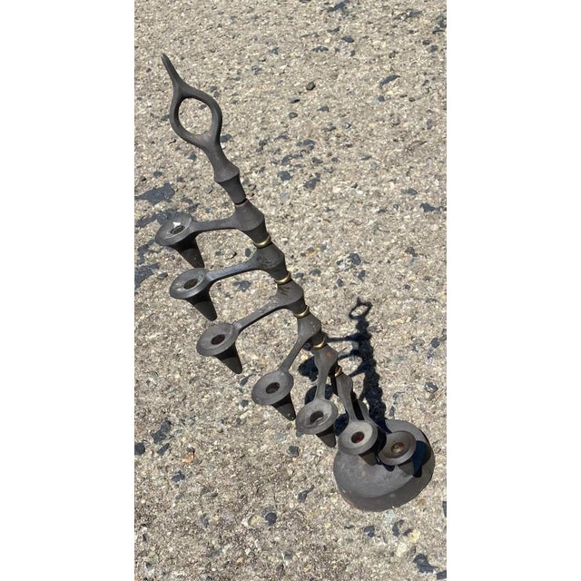 Jens Harald Quistgaard for Dansk Denmark in Iron, with brass spacers. Rotating. Tabletop Candleholder, 1960s. Uses tiny...