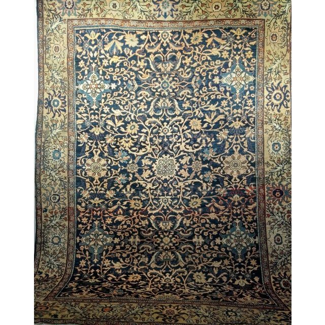 This exceptional 19th century Persian Ziegler Mahal Sultanabad rug showcases a refined all-over pattern on a rich navy...