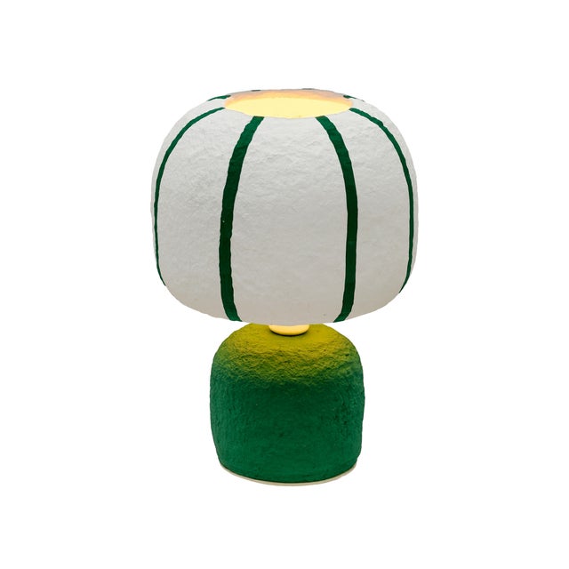 The Margate Table Lamp is a small piece with a lot of personality. Made from textured cotton mache, it brings an earthy...