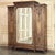 19th Century French Louis XVI Walnut Triple Armoire was crafted from select French walnut and finely cast brass, the...