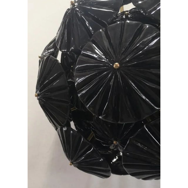 The large glass flowers make up this Murano chandelier from the 2000. A Classic Sputnik from the middle of the century....