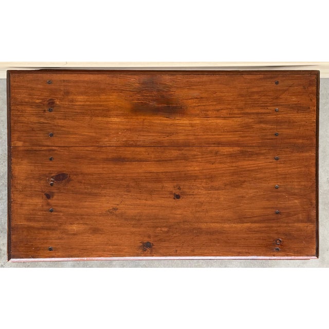 19th Spanish side table with turned legs and double stretcher, one in solid iron and one in the lower part leg to leg in...