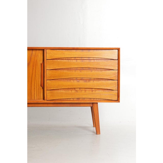 Height: 80 cm. Width: 240 cm. Depth: 46 cm. This piece is attributed to the mentioned designer/maker. It has no...