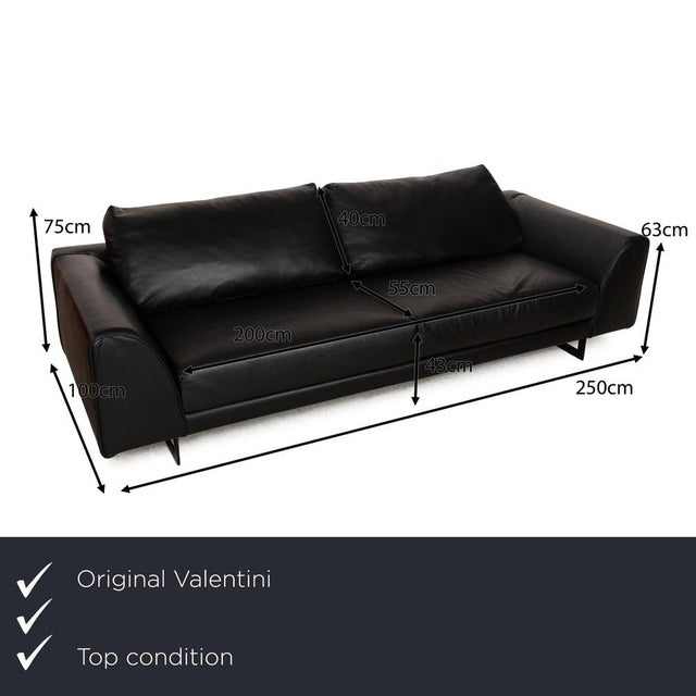 The Ernest New sofa by Valentini is covered in black leather and stands on black metal runners. The four-seater is...