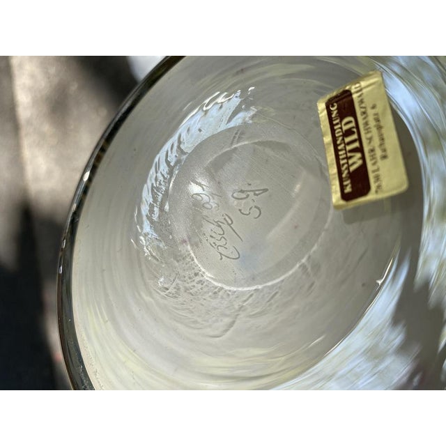 This exquisite piece from the renowned eisch glassworks embodies the mastery of the german studio glass movement. The vase...