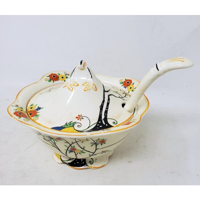 This vintage 1930s Woods Ivory Ware sauce or gravy bowl is made of porcelain with an Art Deco style. It features a tree...