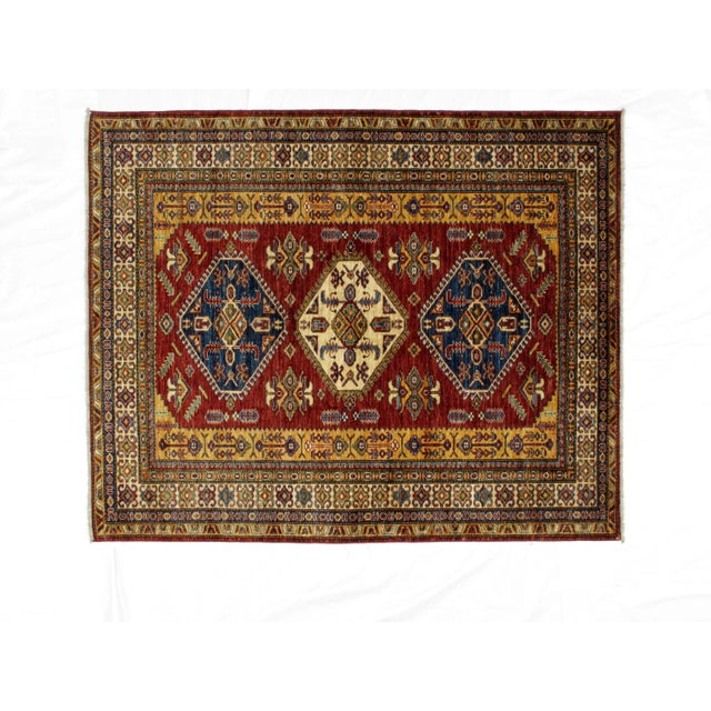 This master piece is a Ghazni wool pile genuine hand woven Super quality Khotan rug in mint condition.