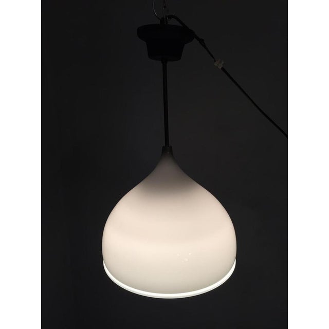 Chandelier in Gray Glass and Interlocking Milk Glass by Massimo Vignelli for Venini, 1950s, in Very Good conditions....