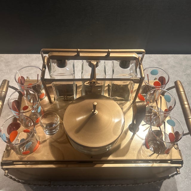 Set includes…3 glass decanter for Bourbon, Gin, and Vodka; 6 glasses; 1 shot glass; 1 ice tong; glass ice bucket with...