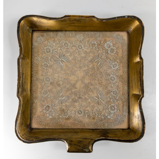 We are selling this very unique little serving tray. This tray has giltwood Florentine style frame with a glass top...