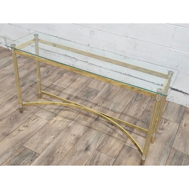 This is an absolutely beautiful vintage mid-century Hollywood Regency Labarge style brass and glass console table, hall...