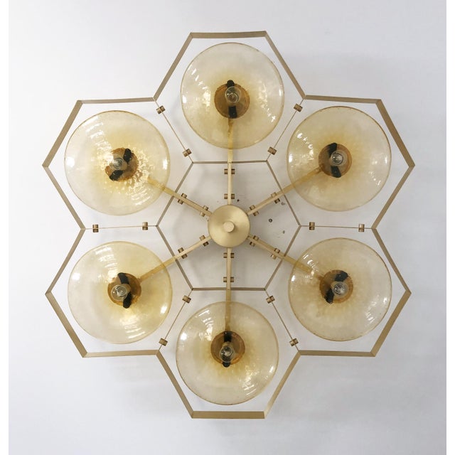 Italian midcentury flush mount with six amber Murano glass shades carefully hand blown with bubbles inside the glass using...