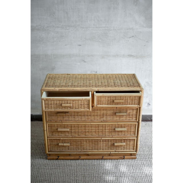 Small Bamboo and Rattan Chest of Drawers – 1980s Structure crafted in natural-finish bamboo, entirely covered in woven...