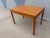 A beautifully crafted Mid-Century Modern side table attributed to Heggen of Norway, showcasing the clean lines and warm...