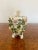 Antique Victorian quality continental porcelain cherub in a vase decorated with leaves and flowers in wonderful green,...