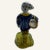 This little Quimper style figurine is painted in the usual colors found in this type of faience. The painting is primitive...