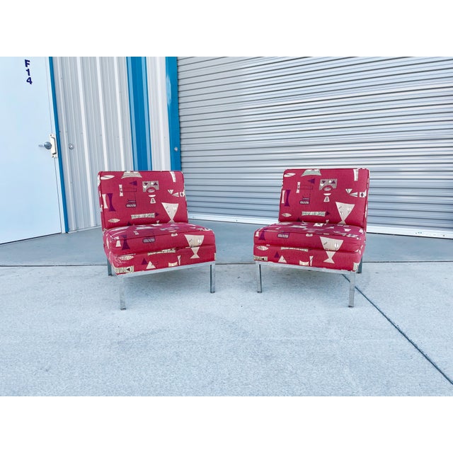 ✨ Vintage 1970s Chrome Lounge Chairs in Bold Red ✨ This stunning pair of 1970s American lounge chairs is a vibrant...