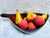An absolutely beautiful mid century carved wood deep leaf shaped bowl and 8 pieces of painted wood fruit. A gorgeous...