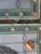 Art Nouveau Two Sets of Art Nouveau Style Floral and Ribbon or Wreath Motifs, Complete With Green and White Opalescent/Textured Glass and Jewel Accents For Sale - Image 3 of 6