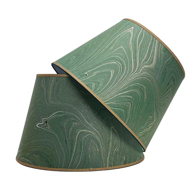 Bespoke lampshade in dark green marbled paper and trimmed two colors of grosgrain. Available in 3 sizes: 8” x 12” x 8.75”...