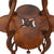 This antique plant stand, attributed to RJ Horner, is crafted from mahogany and features a distinctive cloverleaf design....