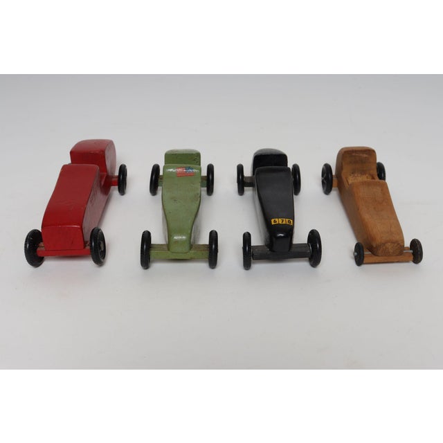 Rustic Set of Four Vintage Painted Pinewood Racers For Sale - Image 3 of 18