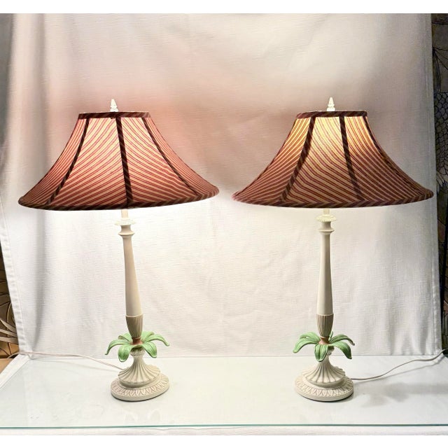 Illuminate your living space with this stunning pair of Vintage Palm Beach Regency Palm Tree Table Lamps, a perfect blend...