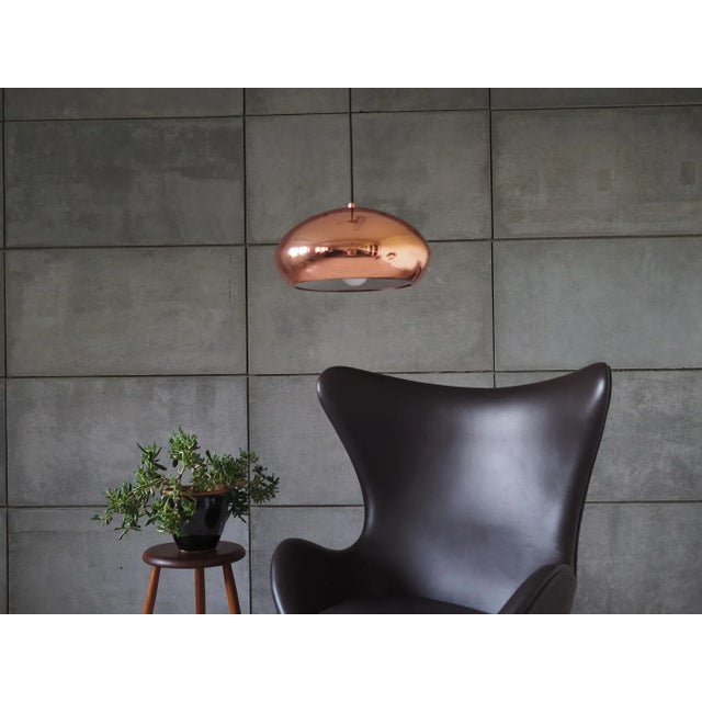 The lamp was made in the 1990s, danish production. the lamp is made of metal in pink colour. The cord is adjustable in...