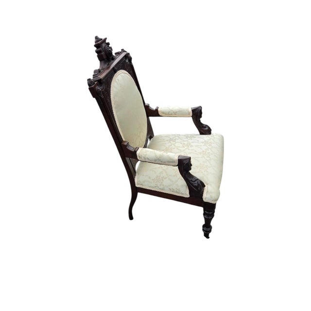 This 19th century American Victorian walnut bedroom chair by John Jeliff is a unique and beautifully crafted antique...
