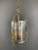 Neoclassical Pendant Light in Brass and Glass Admire this remarkably refined neoclassical pendant light, a centerpiece...